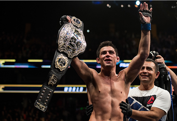 Dominick Cruz celebrates after defeating TJ Dillashaw in January to earn back his bantamweight title