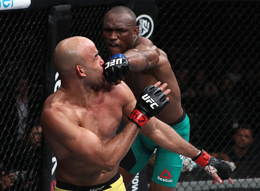 SAO PAULO, BRAZIL - NOVEMBER 19: Kamaru Usman of Nigeria punches Warlley Alves of Brazil during their welterweight bout at the UFC Fight Night Bader v Minotouro at Ibirapuera Gymnasium on November 19, 2016 in Sao Paulo, Brazil. (Photo by Buda Mendes/Zuffa LLC)