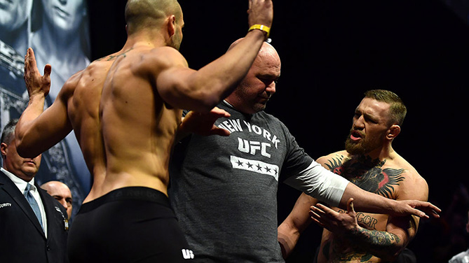 NEW YORK, NY - NOVEMBER 11: (R-L) Conor McGregor of Ireland and Eddie Alvarez face off during the UFC 205 weigh-in inside Madison Square Garden on November 11, 2016 in New York City. (Photo by Brandon Magnus/Zuffa LLC)