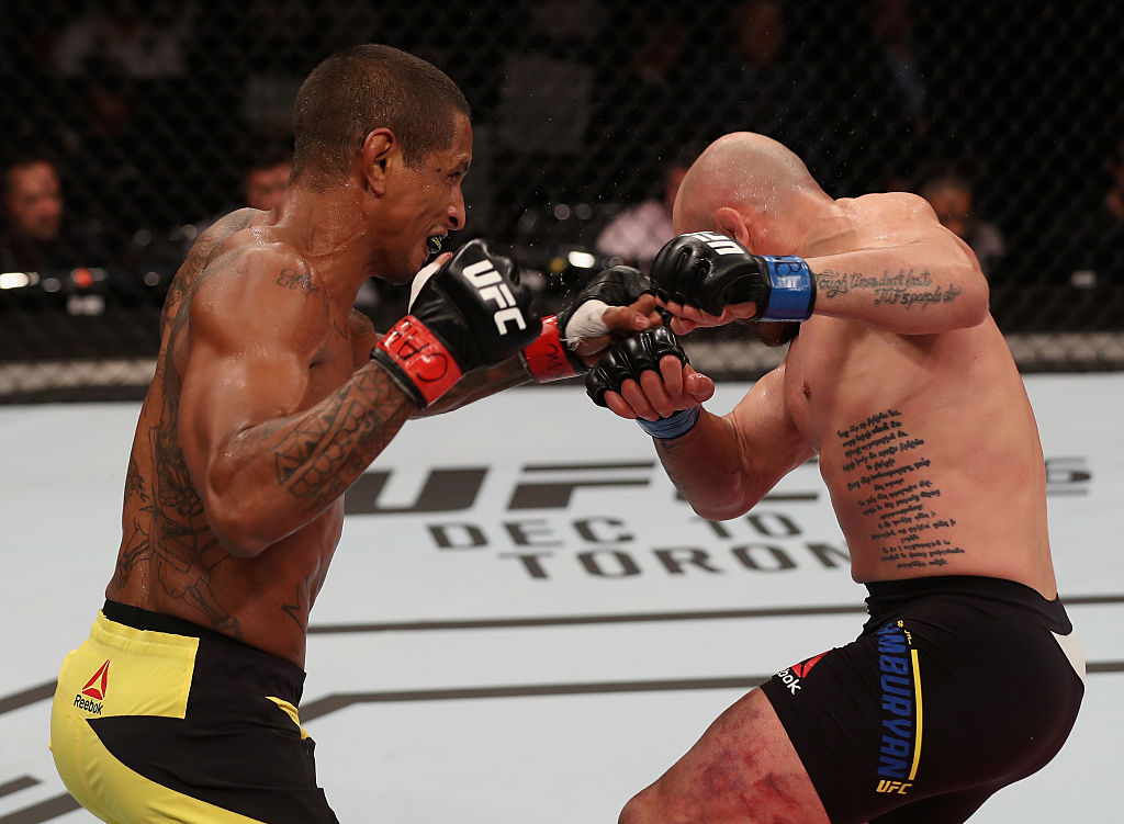 SAO PAULO, BRAZIL - NOVEMBER 19: Johnny Eduardo of Brazil punches Many Gamburyan of Armenia at the UFC Fight Night Bader v Minotouro at Ibirapuera Gymnasium on November 19, 2016 in Sao Paulo, Brazil. (Photo by Buda Mendes/Zuffa LLC)