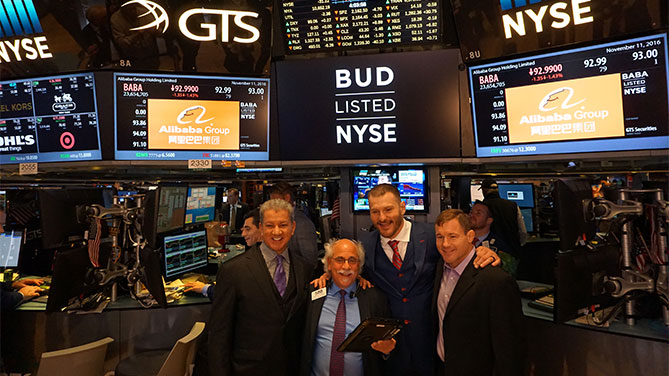 Buffer, Miocic and Hughes with 'the most photographed trader On Wall Street' Peter Tuchman(Photo credit: Nancy Gay/UFC)