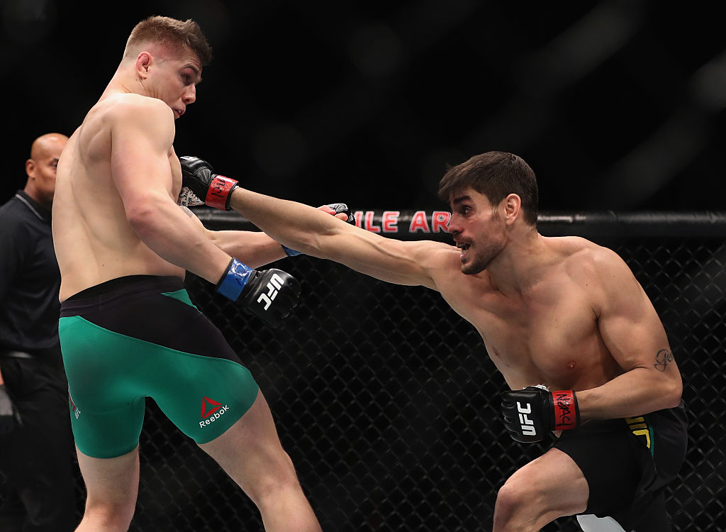 Antonio Carlos Junior of Brazil punches Marvin Vettori of Italy in their middleweight bout (Photo by Christian Petersen/Getty Images)