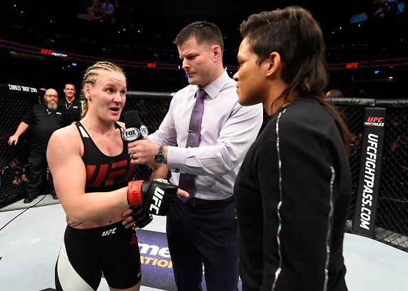 DENVER, CO - JANUARY 28: (L-R) Valentina Shevchenko of Kyrgyzstan and UFC women's bantamweight champion Amanda Nunes speak to Brian Stan during the UFC Fight Night event at the Pepsi Center on January 28, 2017 in Denver, Colorado. (Photo by Josh Hedges/Zuffa LLC)