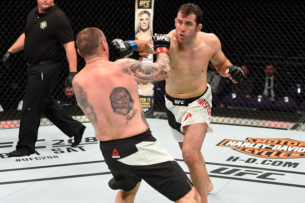 PHOENIX, AZ – JAN. 15: (R-L) Joachim Christensen of Denmark punches Bojan Mihajlovic of Serbia in their light heavyweight bout during the UFC Fight Night event inside Talking Stick Resort Arena. (Photo by Jeff Bottari/Zuffa LLC)