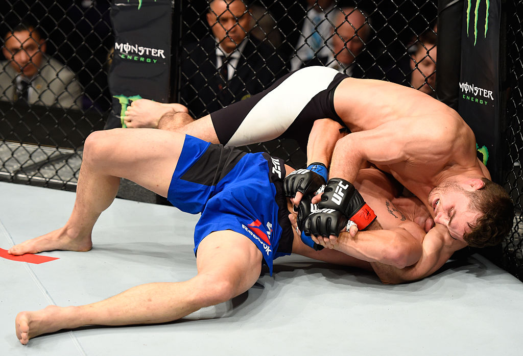 PHOENIX, AZ - JAN. 15: Tony Martin (top) attempts to submit Alex White in their lightweight bout during the UFC Fight Night event inside Talking Stick Resort Arena. (Photo by Jeff Bottari/Zuffa LLC)