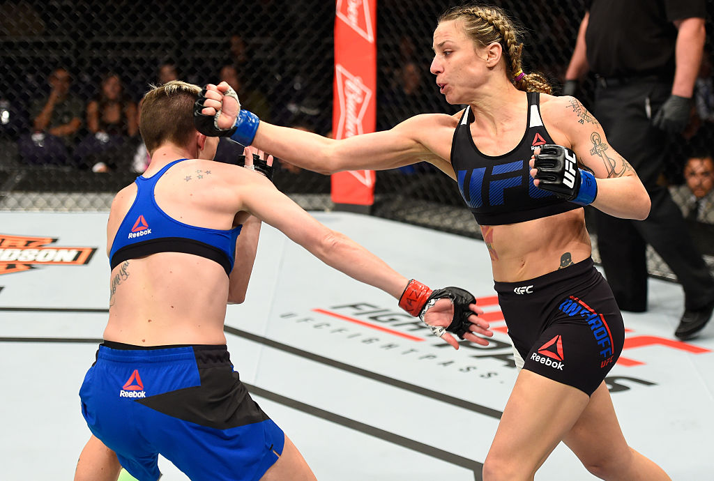 PHOENIX, AZ – JAN. 15: (R-L) Nina Ansaroff punches Jocelyn Jones-Lybarger in their women's strawweight bout during the UFC Fight Night event inside Talking Stick Resort Arena. (Photo by Jeff Bottari/Zuffa LLC)