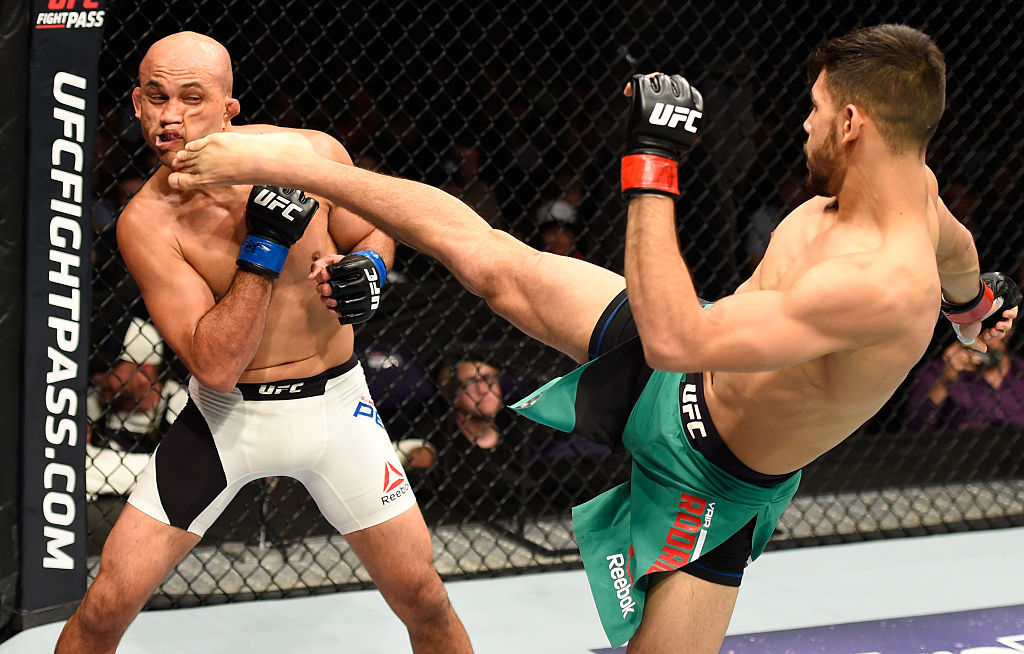 PHOENIX, AZ - JAN. 15: (R-L) Yair Rodriguez of Mexico kicks BJ Penn in their featherweight bout during the UFC Fight Night event inside Talking Stick Resort Arena. (Photo by Jeff Bottari/Zuffa LLC)