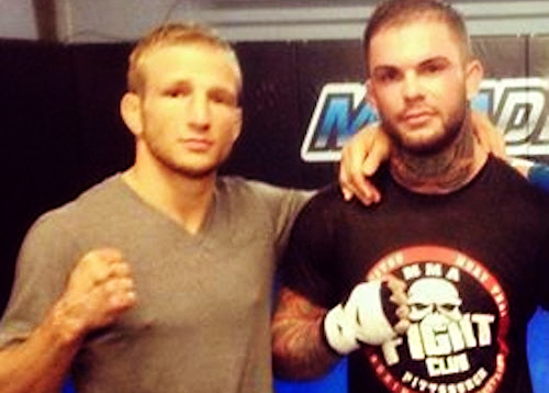 Former teammates TJ Dillashaw (left) and Cody Garbrandt pose for a photo.