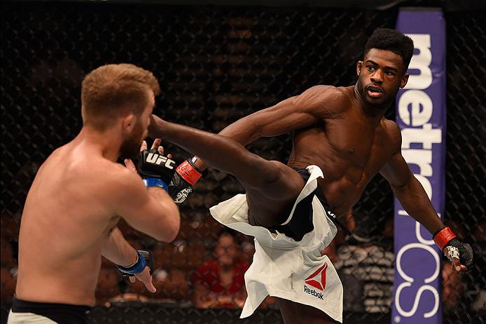 LAS VEGAS, NV - MAY 29: (R-L) Aljamain Sterling kicks Bryan Caraway in their bantamweight bout during the UFC Fight Night event inside the Mandalay Bay Events Center on May 29, 2016 in Las Vegas, Nevada. (Photo by Josh Hedges/Zuffa LLC)