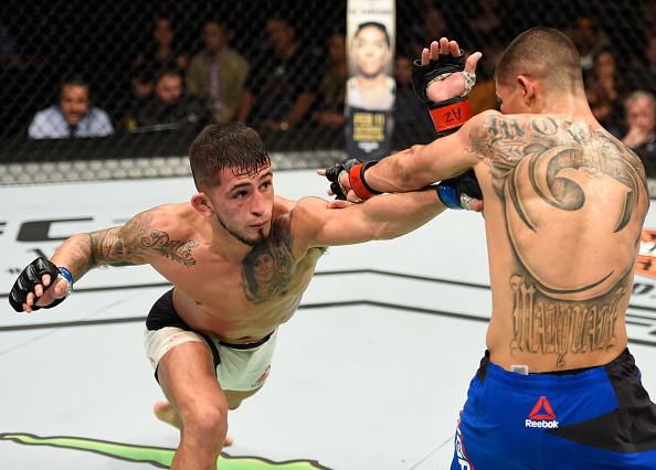 Sergio Pettis punches John Moraga during their bout at Fight Night Phoenix on Sunday