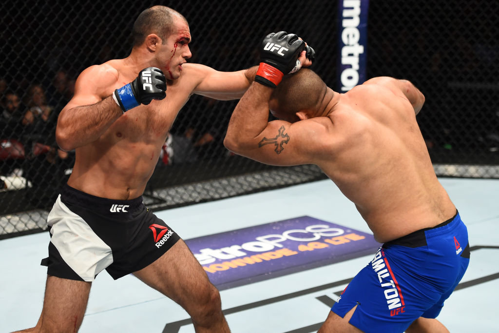 HOUSTON, TX - FEBRUARY 04: (L-R) Marcel Fortuna of Brazil punches Anthony Hamilton in their heavyweight bout during the UFC Fight Night event at the Toyota Center on February 4, 2017 in Houston, Texas. (Photo by Jeff Bottari/Zuffa LLC)