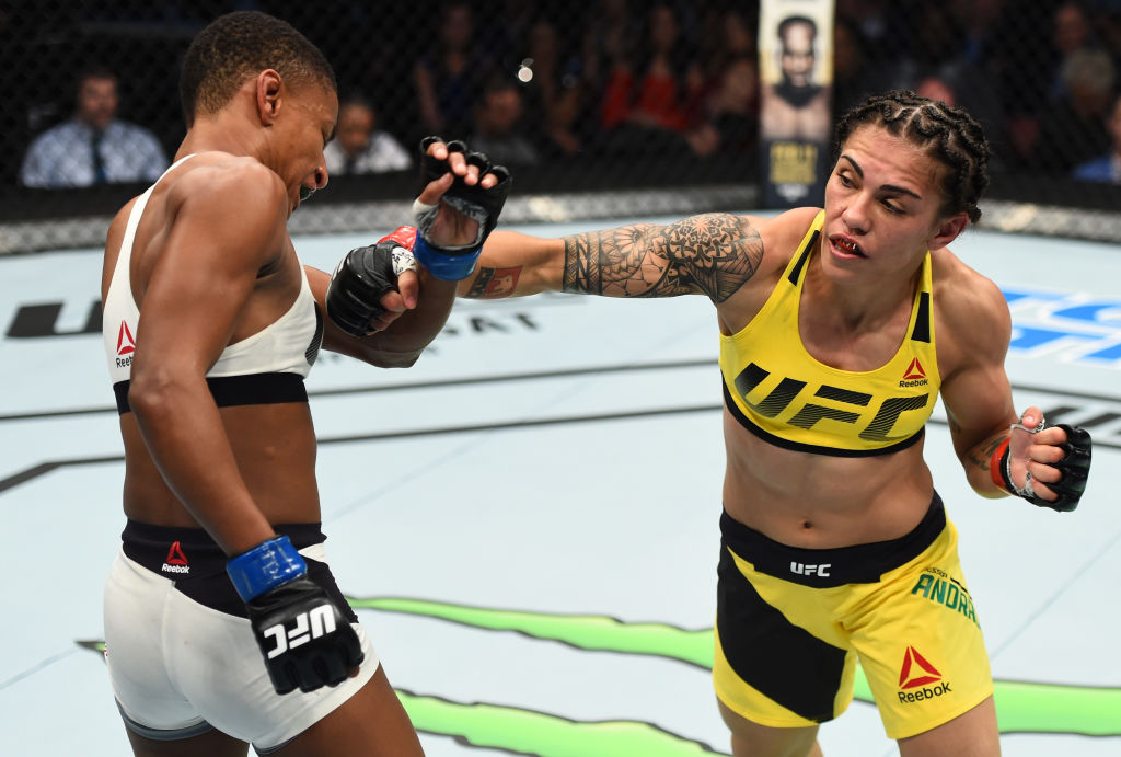 HOUSTON, TX - FEBRUARY 04: (R-L) Jessica Andrade of Brazil punches Angela Hill in their women's strawweight bout during the UFC Fight Night event at the Toyota Center on February 4, 2017 in Houston, Texas. (Photo by Jeff Bottari/Zuffa LLC)