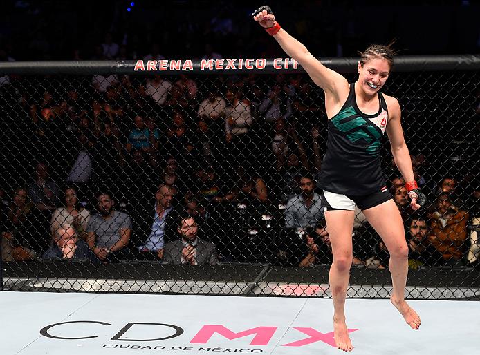 MEXICO CITY, MEXICO - NOVEMBER 05: Alexa Grasso of Mexico raises her hands after facing Heather Jo Clark of the United States in their women's strawweight bout during the UFC Fight Night event at Arena Ciudad de Mexico on November 5, 2016 in Mexico City, Mexico. (Photo by Jeff Bottari/Zuffa LLC)