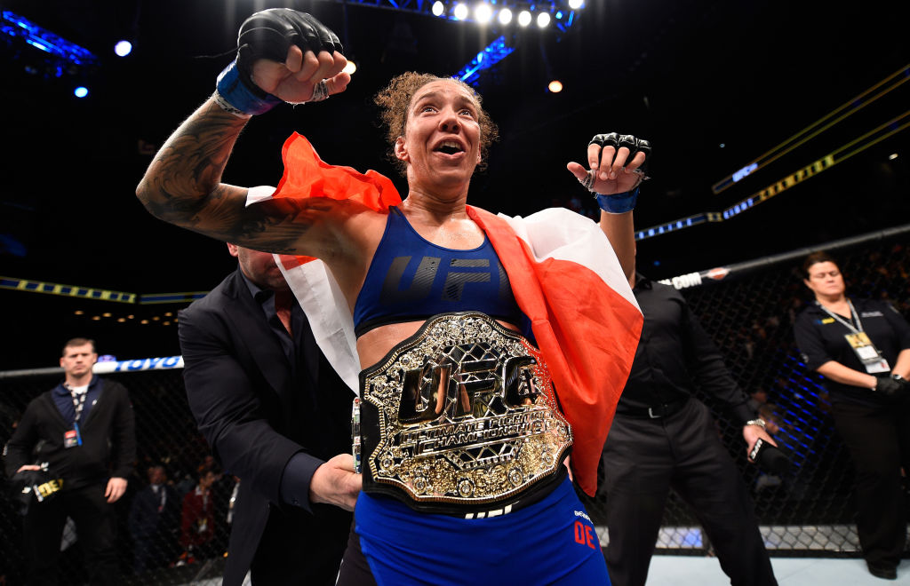 BROOKLYN, NEW YORK - FEBRUARY 11: Germaine de Randamie of The Netherlands celebrates her victory over Holly Holm in their women's featherweight championship bout during the UFC 208 event inside Barclays Center on February 11, 2017 in Brooklyn, New York. (Photo by Jeff Bottari/Zuffa LLC)