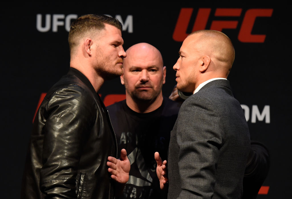 LAS VEGAS, NV - MARCH 03: (L-R) UFC middleweight champion Michael Bisping of England faces off against Georges St-Pierre of Canada during the UFC press conference at T-Mobile arena on March 3, 2017 in Las Vegas, Nevada. (Photo by Josh Hedges/Zuffa LLC)