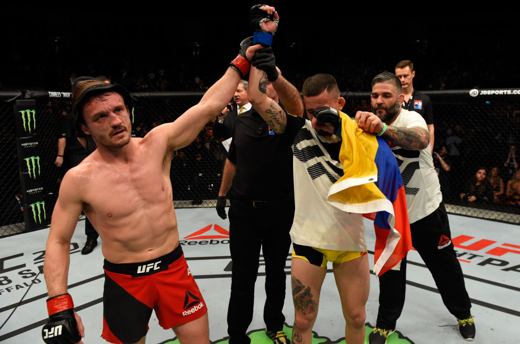 LONDON, ENGLAND - MARCH 18: (L-R) Brad Pickett of England raises Marlon Vera of Ecuador's hand after their bantamweight fight during the UFC Fight Night event at The O2 arena on March 18, 2017 in London, England. (Photo by Josh Hedges/Zuffa LLC)