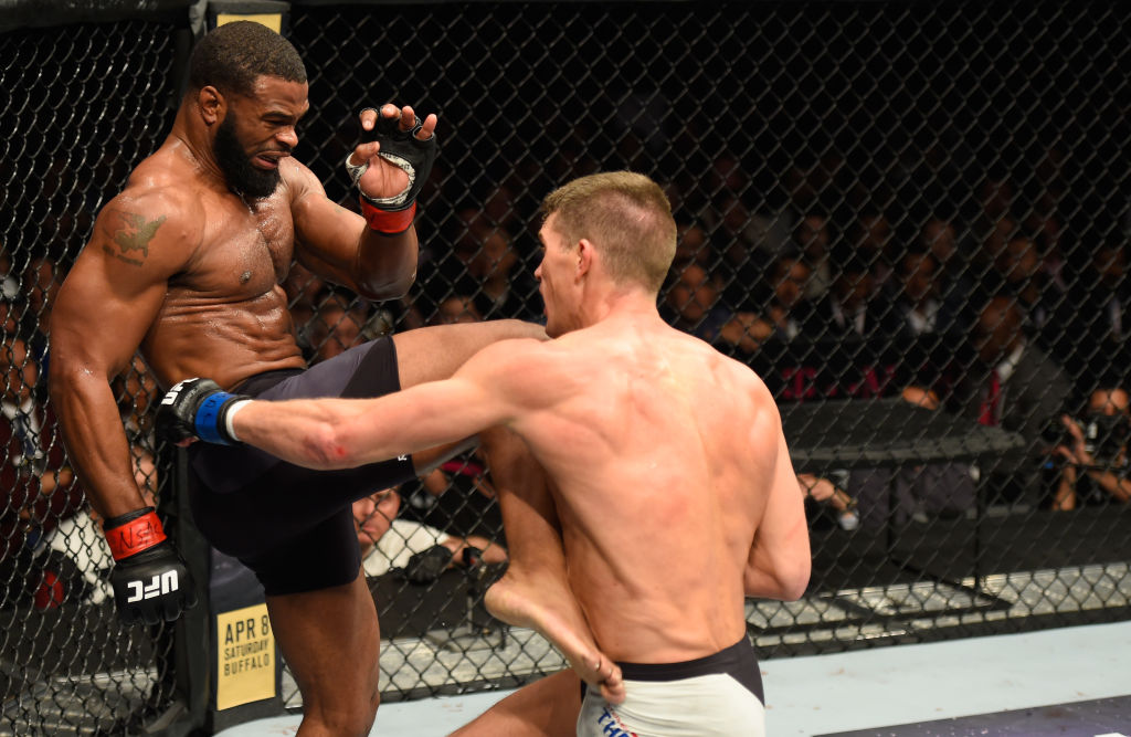 LAS VEGAS, NV - MARCH 04: (L-R) Tyron Woodley knees Stephen Thompson in their UFC welterweight championship bout during the UFC 209 event at T-Mobile Arena on March 4, 2017 in Las Vegas, Nevada. (Photo by Josh Hedges/Zuffa LLC)