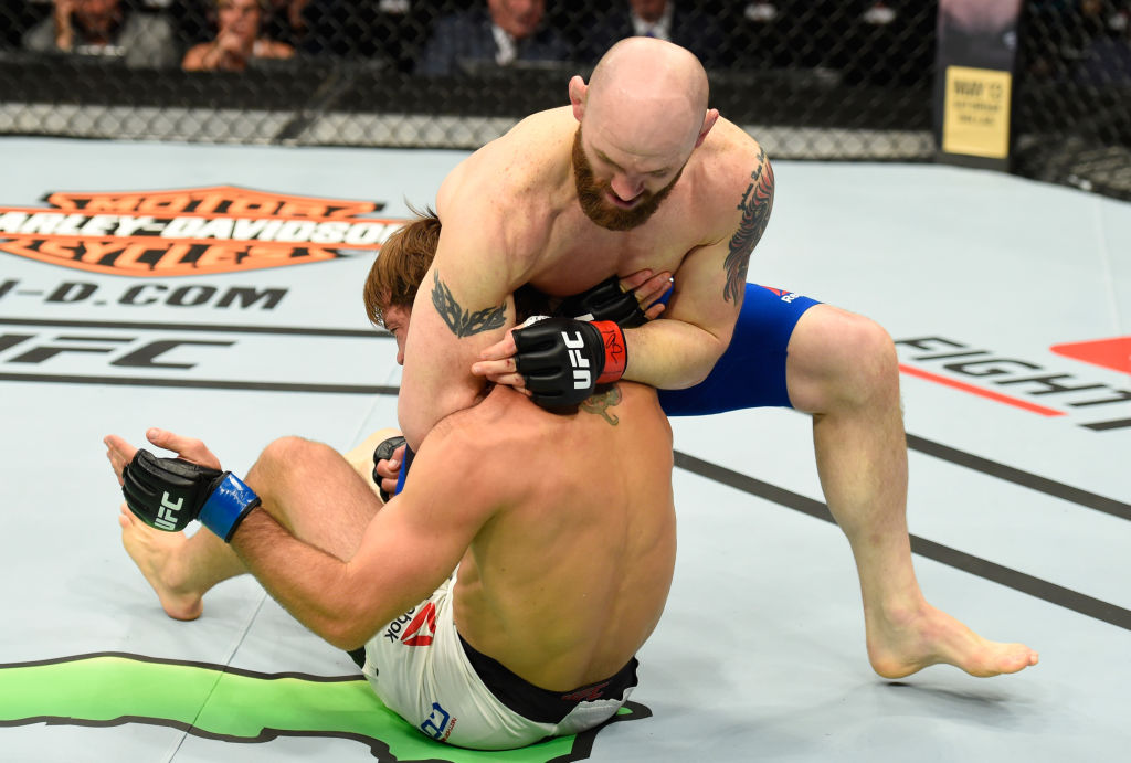 KANSAS CITY, MO - APRIL 15: (R-L) Zak Cummings attempts to submit Nathan Coy in their welterweight fight during the UFC Fight Night event at Sprint Center on April 15, 2017 in Kansas City, Missouri. (Photo by Josh Hedges/Zuffa LLC)