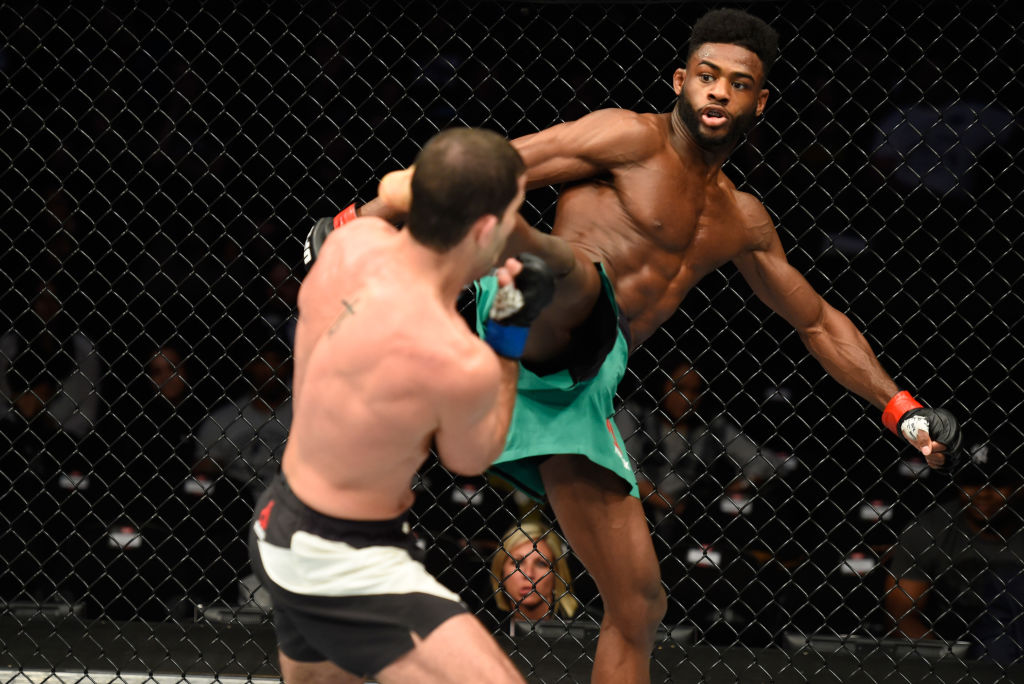  KANSAS CITY, MO - APRIL 15: (R-L) Aljamain Sterling kicks Augusto Mendes of Brazil in their bantamweight fight during the UFC Fight Night event at Sprint Center on April 15, 2017 in Kansas City, Missouri. (Photo by Josh Hedges/Zuffa LLC)