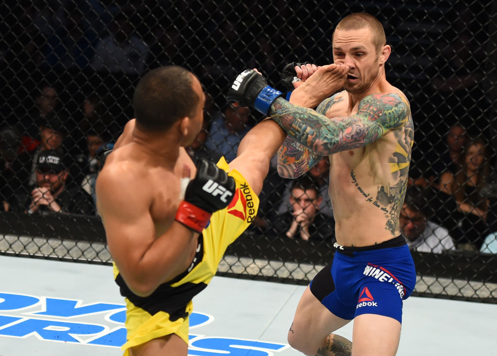 NASHVILLE, TN - APRIL 22: (L-R) John Dodson kicks Eddie Wineland in their bantamweight bout during the UFC Fight Night event at Bridgestone Arena on April 22, 2017 in Nashville, Tennessee. (Photo by Jeff Bottari/Zuffa LLC)