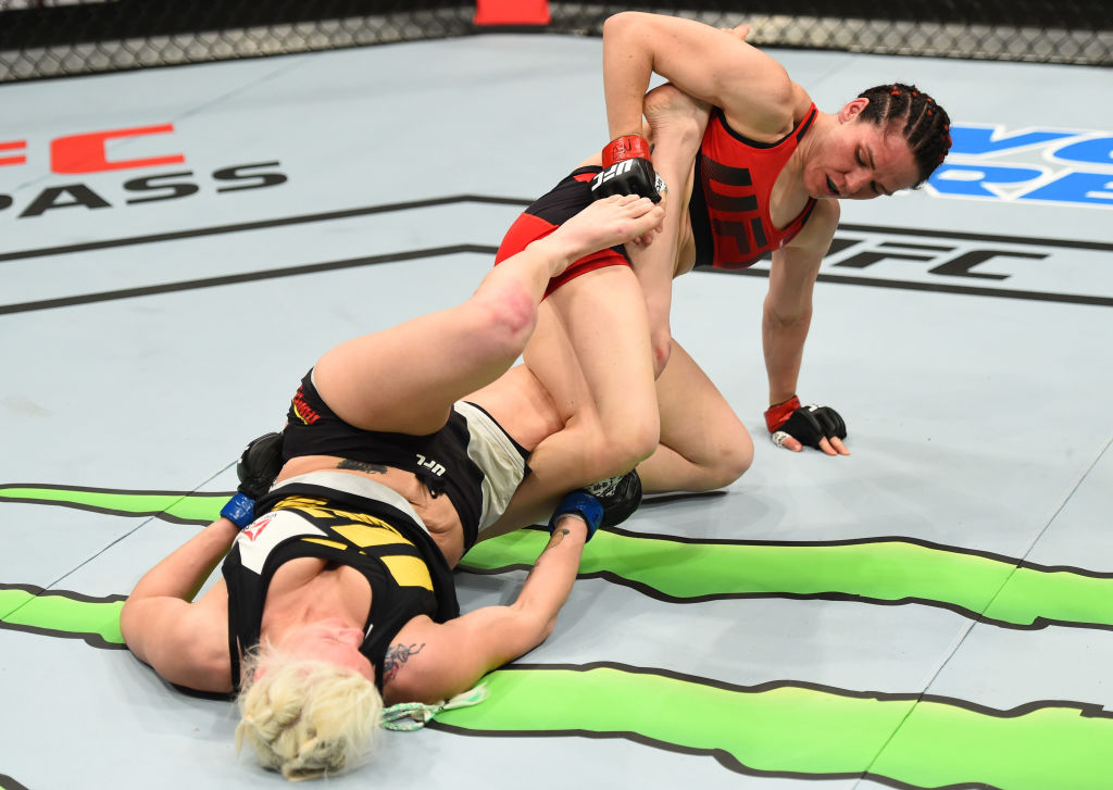 NASHVILLE, TN - APRIL 22: (R-L) Alexis Davis of the Canada attempts to secure a leg lock against Cindy Dandois of Belgium in their women's bantamweight bout during the UFC Fight Night event at Bridgestone Arena on April 22, 2017 in Nashville, Tennessee. (Photo by Jeff Bottari/Zuffa LLC)