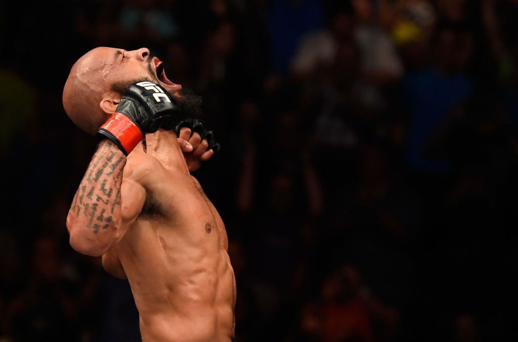 KANSAS CITY, MO - APRIL 15: Demetrious Johnson celebrates his submission victory over Wilson Reis of Brazil in their UFC flyweight fight during the UFC Fight Night event at Sprint Center on April 15, 2017 in Kansas City, Missouri. (Photo by Josh Hedges/Zuffa LLC)