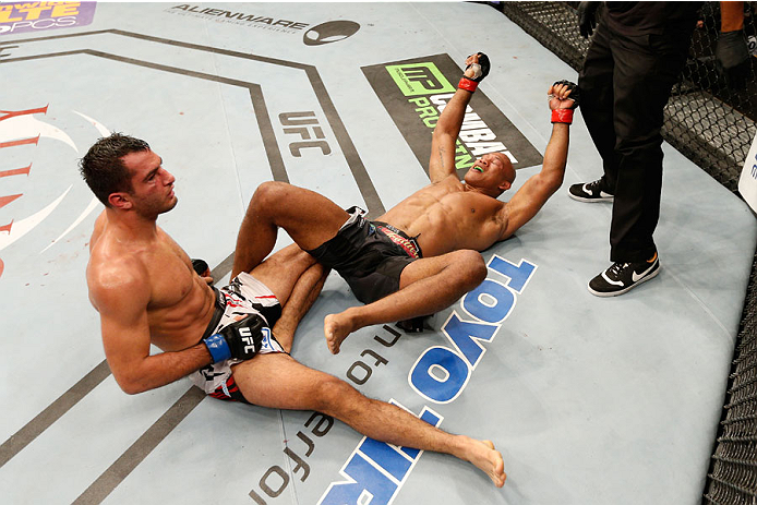 Jacare Souza submits Gegard Mousasi during their middleweight bout in 2014