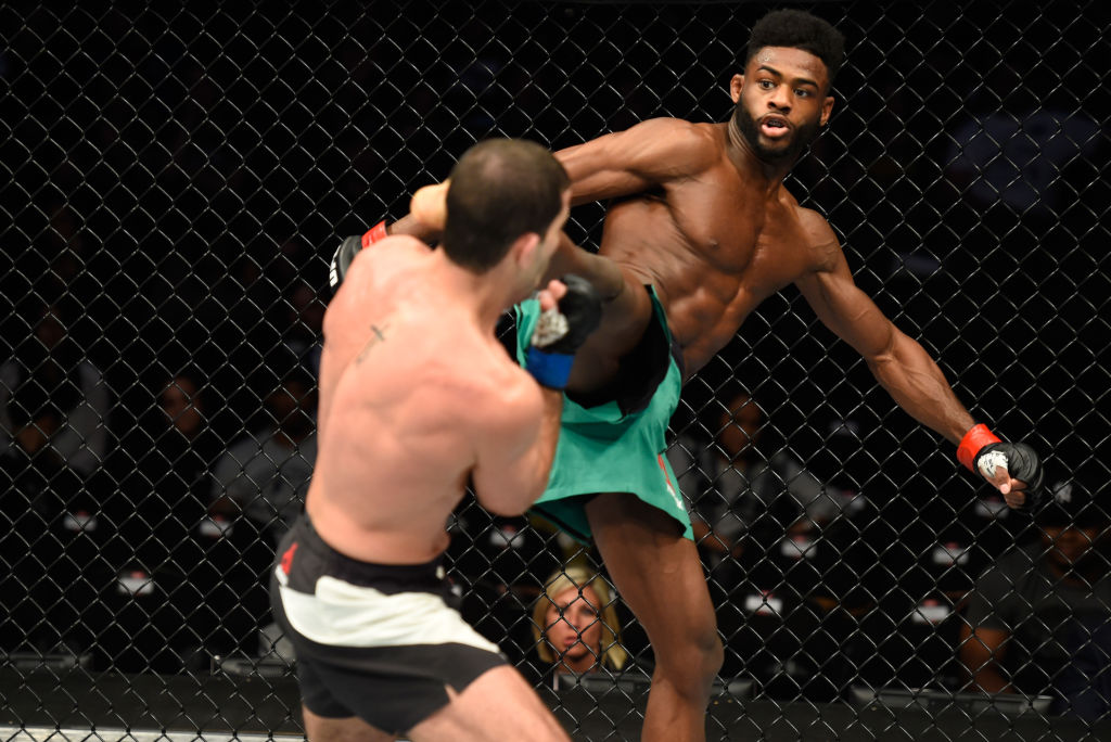 KANSAS CITY, MO - APRIL 15: (R-L) Aljamain Sterling kicks Augusto Mendes of Brazil in their bantamweight fight during the UFC Fight Night event at Sprint Center on April 15, 2017 in Kansas City, Missouri. (Photo by Josh Hedges/Zuffa LLC)