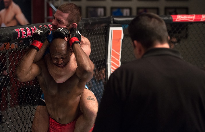 Tom Gallicchio locks in a rear naked choke on Eddie Gordon during The Ultimate Fighter: Redemption