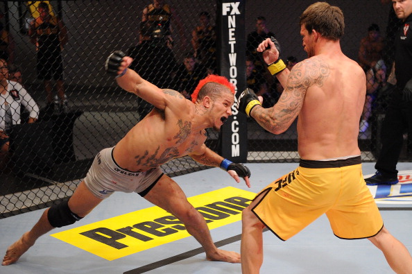 LAS VEGAS, NV - AUGUST 13: (L-R) Julian Lane throws a punch at Bristol Marunde during their preliminary fight during filming of The Ultimate Fighter Season 16, aired on FX Network October 5, 2012, at the UFC Training Center on August 13, 2012 in Las Vegas, Nevada. (Photo by Al Powers/Zuffa LLC/Zuffa LLC via Getty Images)