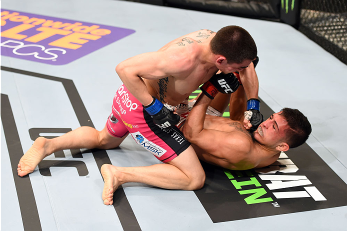 Ryan Benoit lands a punch against Sergio Pettis at UFC 185