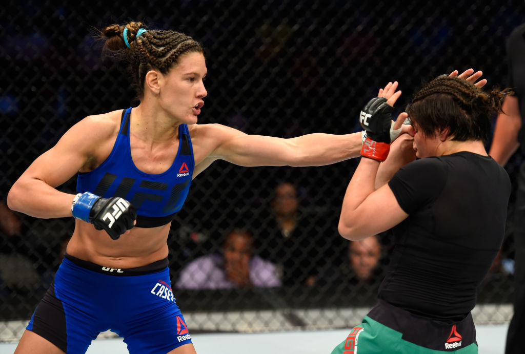 DALLAS, TX - MAY 13: (L-R) Cortney Casey punches Jessica Aguilar in their women's strawweight fight during the UFC 211 event at the American Airlines Center on May 13, 2017 in Dallas, Texas. (Photo by Josh Hedges/Zuffa LLC)