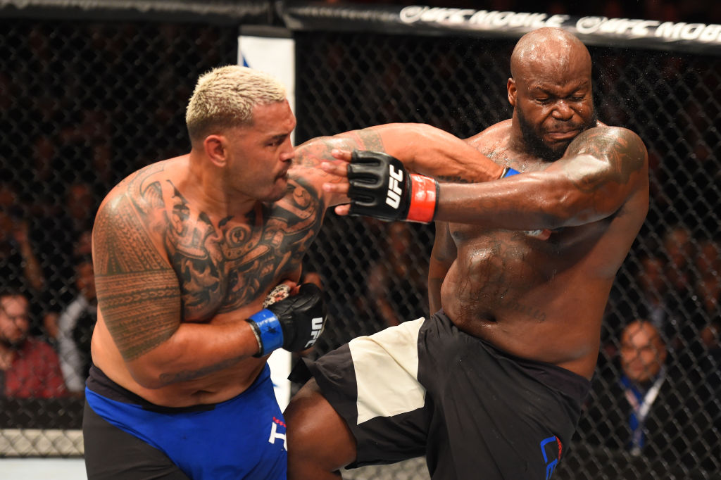 AUCKLAND, NEW ZEALAND - JUNE 11: (L-R) <a href='../fighter/mark-hunt'>Mark Hunt</a> of New Zealand punches <a href='../fighter/Derrick-Lewis'>Derrick Lewis</a> in their heavyweight fight during the <a href='../event/UFC-Silva-vs-Irvin'>UFC Fight Night </a>event at the Spark Arena on June 11, 2017 in Auckland, New Zealand. (Photo by Josh Hedges/Zuffa LLC)“ align=“center“/>Fighting in his native New Zealand for the first time in over 15 years, 43-year-old <a href=
