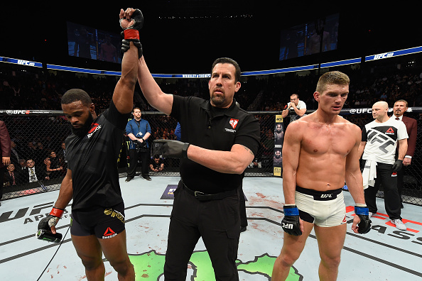 LAS VEGAS, NV - MARCH 04: Tyron Woodley (left) reacts to his victory over Stephen Thompson (right) in their UFC welterweight championship bout during the UFC 209 event at T-Mobile Arena on March 4, 2017 in Las Vegas, Nevada. (Photo by Josh Hedges/Zuffa LLC)