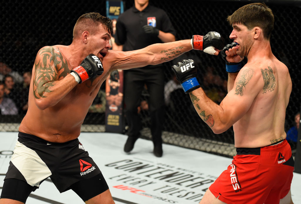  GLASGOW, SCOTLAND - JULY 16: (L-R) Jack Marshman of Wales punches Ryan Janes of Canada in their middleweight bout during the UFC Fight Night event at the SSE Hydro Arena Glasgow on July 16, 2017 in Glasgow, Scotland. (Photo by Josh Hedges/Zuffa LLC)