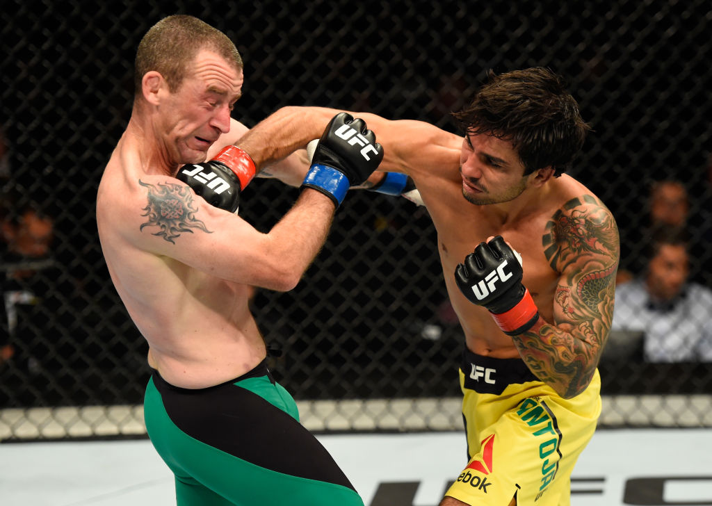 GLASGOW, SCOTLAND - JULY 16: (R-L) Alexandre Pantoja of Brazil punches Neil Seery of Ireland in their flyweight bout during the UFC Fight Night event at the SSE Hydro Arena Glasgow on July 16, 2017 in Glasgow, Scotland. (Photo by Josh Hedges/Zuffa LLC)