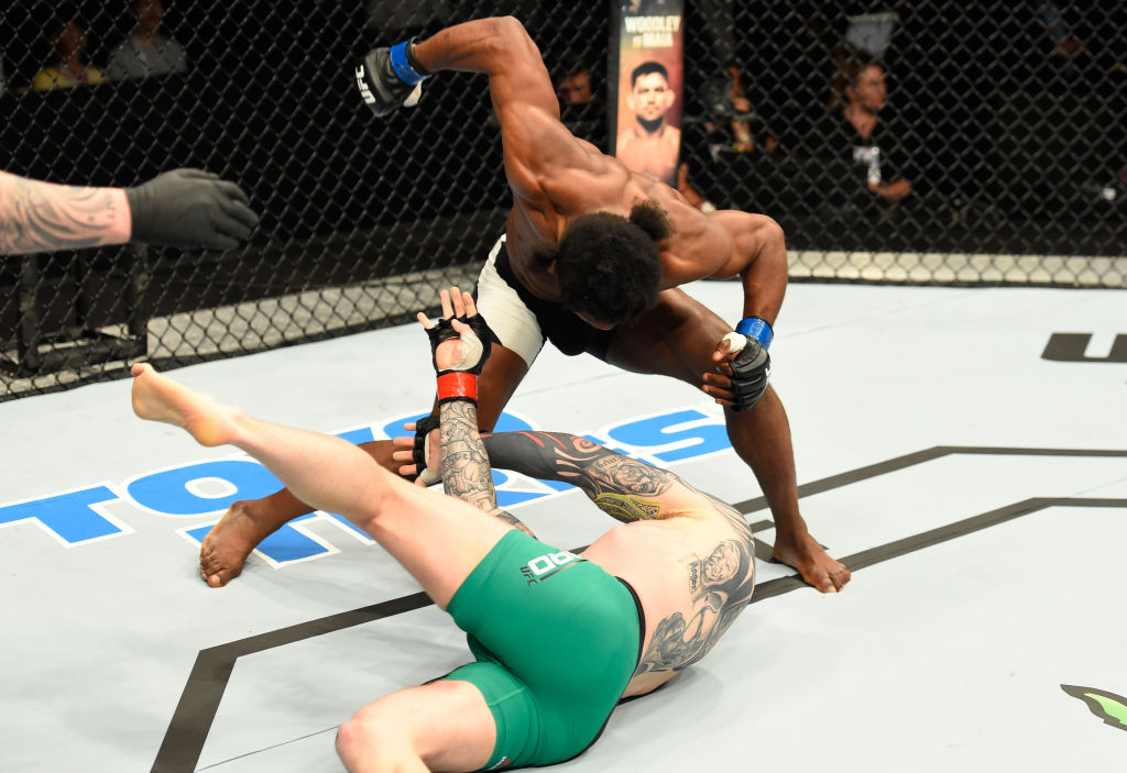 GLASGOW, SCOTLAND - JULY 16: (L-R) Galore Bofando of England punches Charlie Ward of Ireland in their welterweight bout during the UFC Fight Night event at the SSE Hydro Arena Glasgow on July 16, 2017 in Glasgow, Scotland. (Photo by Josh Hedges/Zuffa LLC)