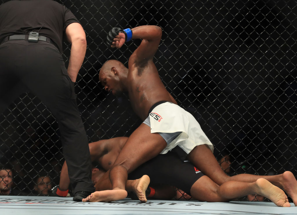 ANAHEIM, CA - JULY 29: <a href='../fighter/Jon-Jones'>Jon Jones</a> punches <a href='../fighter/Daniel-Cormier'>Daniel Cormier</a> in their UFC light heavyweight championship bout during the UFC 214 event at Honda Center on July 29, 2017 in Anaheim, California. (Photo by Sean M. Haffey/Getty Images)“ align=“center“/>For two rounds in the UFC 214 main event at Honda Center, it appeared as if Daniel Cormier was on the verge of getting his redemption against longtime rival Jon Jones. But with one kick to the head, Jones turned everything around and halted the Louisiana native in the third round to regain the UFC light heavyweight title.</p><p>The win was a culmination of a long rivalry with Cormier, who Jones defeated in January 2015, as well as a welcome high point in a two-year stretch in which the New Yorker dealt with out of the Octagon issues that limited him to one April 2016 fight since the first bout with Cormier.</p><p>“I made it back,” said Jones, who originally held the undisputed title from 2011 to 2015 and never lost it in the Octagon. “It’s such a beautiful moment. I did a lot of right things to get back in this position. Anybody at home who let yourself down, you let your family down, you let your parents down or your co-workers down, you let yourself down, it’s never over. As long as you never quit, it’s never over. I’m back here.”</p><p><iframe src=