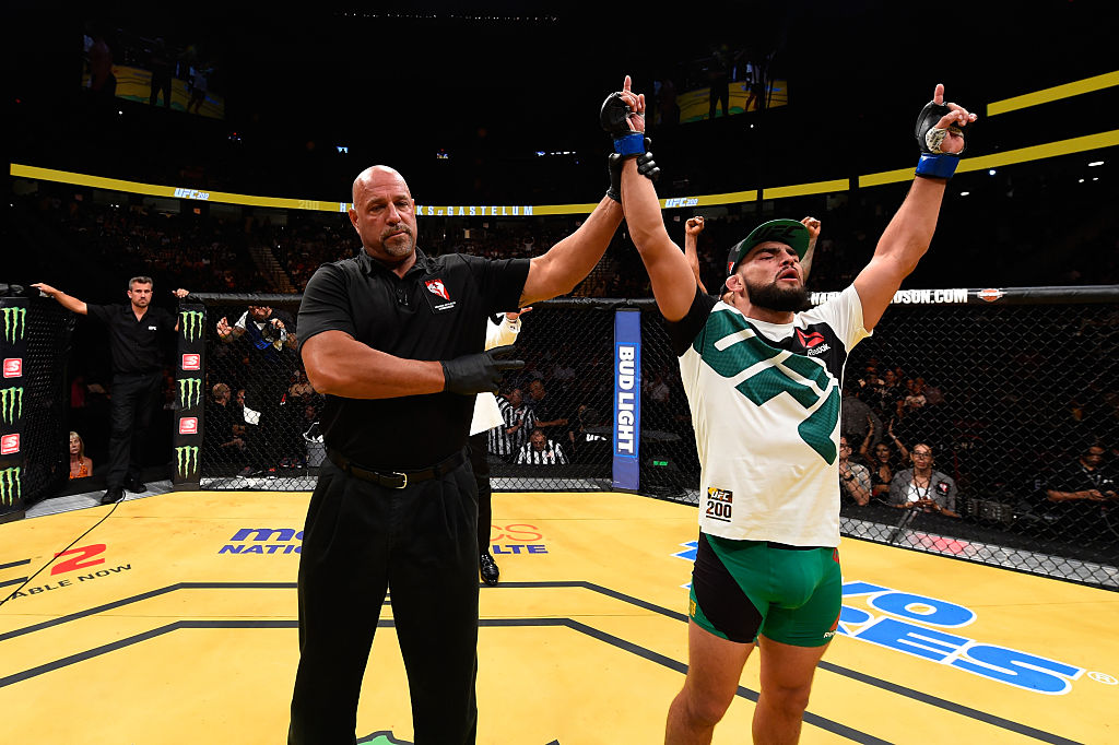 LAS VEGAS, NV - JULY 09: Kelvin Gastelum (right) reacts to his victory over Johny Hendricks in their welterweight bout during the UFC 200 event on July 9, 2016 at T-Mobile Arena in Las Vegas, Nevada. (Photo by Josh Hedges/Zuffa LLC)