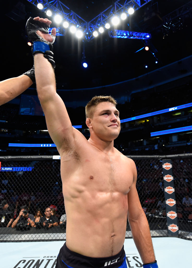 ANAHEIM, CA - JULY 29: <a href='../fighter/Drew-Dober'>Drew Dober</a> celebrates his win over <a href='../fighter/Josh-Burkman'>Joshua Burkman</a> in their lightweight bout during the UFC 214 event at Honda Center on July 29, 2017 in Anaheim, California. (Photo by Josh Hedges/Zuffa LLC)“ align=“left“/>In the lightweight opener, Drew Dober won his clash of veterans against Joshua Burkman, knocking out <a href=