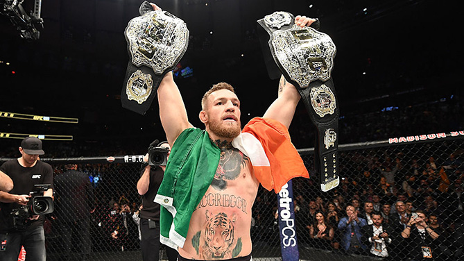 NEW YORK, NY - NOVEMBER 12: Conor McGregor of Ireland celebrates his KO victory over Eddie Alvarez of the United States in their lightweight championship bout during the UFC 205 event at Madison Square Garden on November 12, 2016 in New York City. (Photo by Jeff Bottari/Zuffa LLC)