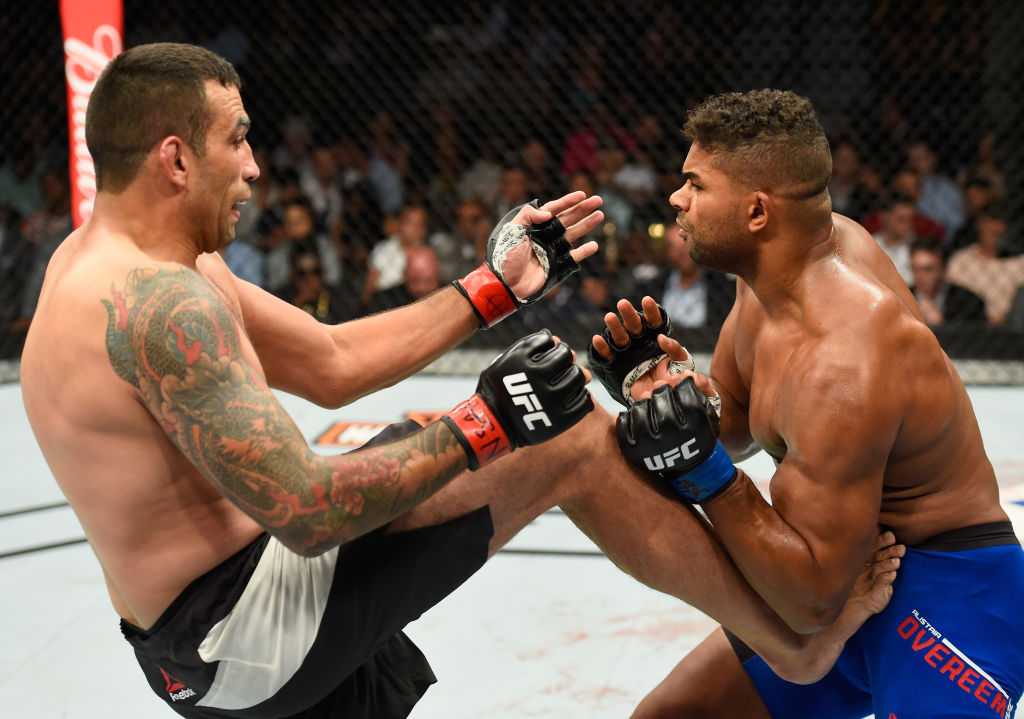 LAS VEGAS, NV - JULY 08: (L-R) <a href='../fighter/Fabricio-Werdum'>Fabricio Werdum</a> of Brazil kicks <a href='../fighter/Alistair-Overeem'>Alistair Overeem</a> of the Netherlands in their heavyweight bout during the UFC 213 event at T-Mobile Arena on July 8, 2017 in Las Vegas, Nevada. (Photo by Josh Hedges/Zuffa LLC)“ align=“center“/>Alistair Overeem emerged victorious in his series with fellow heavyweight contender Fabricio Werdum, winning their rubber match via majority decision in the co-main event of UFC 213 at T-Mobile Arena in Las Vegas Saturday night.</p><p>Scores were 29-28 twice and 28-28 for the No. 3-ranked Overeem, now 43-15 with 1 NC. The No. 1-ranked Werdum falls to 21-7-1.</p><p>Werdum won their first match in PRIDE in 2006, with Overeem evening the score in a 2011 <a href=