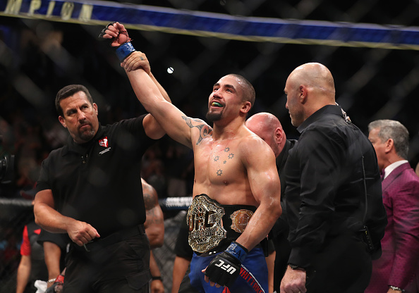 LAS VEGAS, NV - JULY 08: Robert Whittaker of New Zealand celebrates his victory over Yoel Romero of Cuba in their interim UFC middleweight championship bout during the UFC 213 event at T-Mobile Arena on July 8, 2017 in Las Vegas, Nevada. (Photo by Christian Petersen/Zuffa LLC)