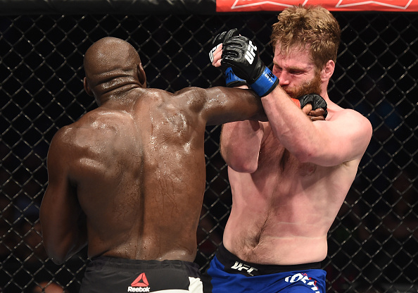 LAS VEGAS, NV - JULY 07: (L-R) Jared Cannonier punches Nick Roehrick in their light heavyweight bout during The Ultimate Fighter Finale at T-Mobile Arena on July 7, 2017 in Las Vegas, Nevada. (Photo by Brandon Magnus/Zuffa LLC/Zuffa LLC via Getty Images)