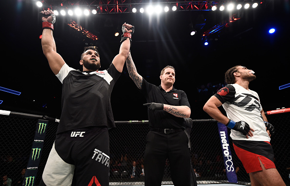 LAS VEGAS, NV - JULY 07: Brad Tavares celebrates after his unanimous-decision victory over Elias Theodorou of Canada in their middleweight bout during The Ultimate Fighter Finale at T-Mobile Arena on July 7, 2017 in Las Vegas, Nevada. (Photo by Brandon Magnus/Zuffa LLC/Zuffa LLC via Getty Images)