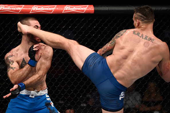 LAS VEGAS, NV - JULY 07: (R-L) James Krause kicks Tom Gallicchio in their welterweight bout during The Ultimate Fighter Finale at T-Mobile Arena on July 7, 2017 in Las Vegas, Nevada. (Photo by Brandon Magnus/Zuffa LLC/Zuffa LLC via Getty Images)