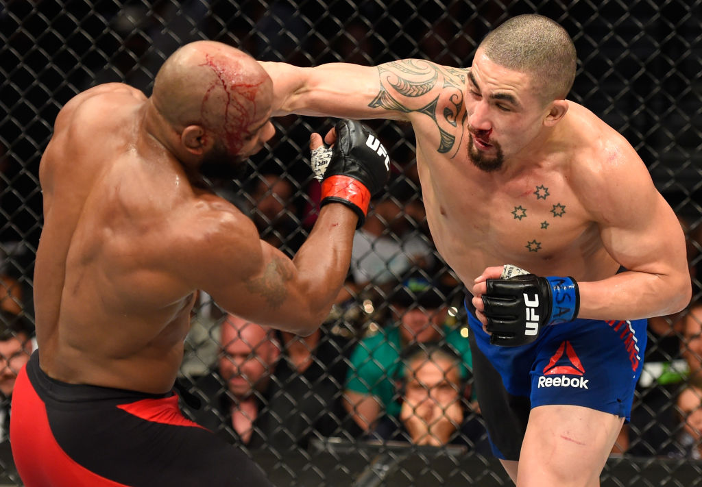 LAS VEGAS, NV - JULY 08: (R-L) Robert Whittaker of New Zealand punches Yoel Romero of Cuba in their interim UFC middleweight championship bout during the UFC 213 event at T-Mobile Arena on July 8, 2017 in Las Vegas, Nevada. (Photo by Josh Hedges/Zuffa LLC)