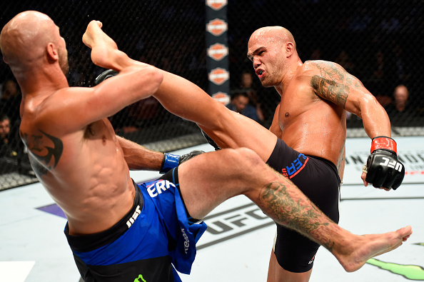 ANAHEIM, CA - JULY 29: Robbie Lawler kicks Donald Cerrone in their welterweight bout during the UFC 214 event at Honda Center on July 29, 2017 in Anaheim, California. (Photo by Josh Hedges/Zuffa LLC/Zuffa LLC via Getty Images)