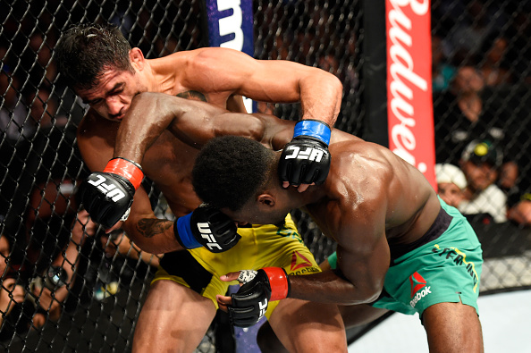 ANAHEIM, CA - JULY 29: Aljamain Sterling elbows Renan Barao of Brazil in their 140-pound catchweight bout during the UFC 214 event at Honda Center on July 29, 2017 in Anaheim, California. (Photo by Josh Hedges/Zuffa LLC/Zuffa LLC via Getty Images)