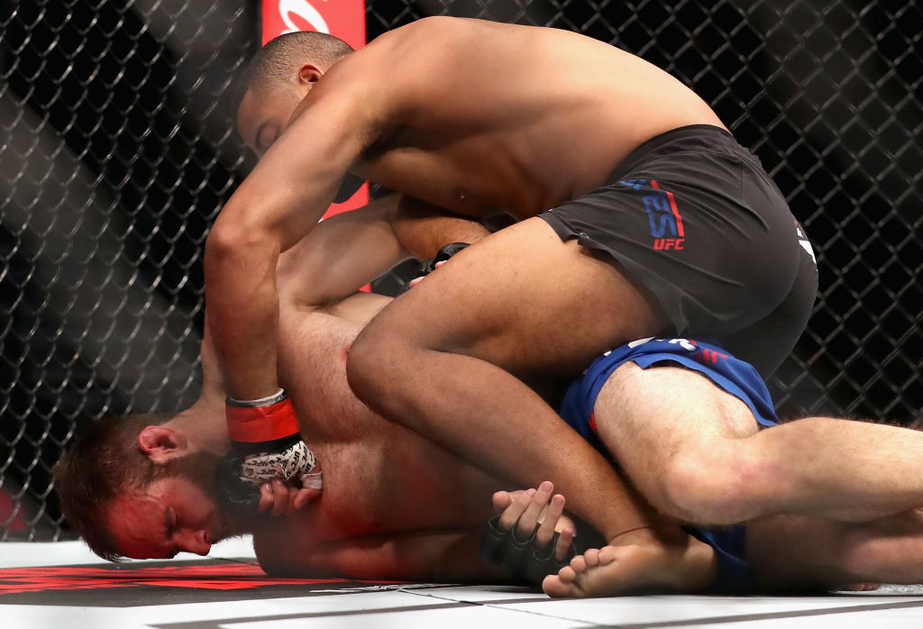 LAS VEGAS, NV - JULY 08: <a href='../fighter/Trevin-Giles'>Trevin Giles</a> (top) punches <a href='../fighter/James-Bochnovic'>James Bochnovic</a> in their light heavyweight bout during the UFC 213 event at T-Mobile Arena on July 8, 2017 in Las Vegas, Nevada. (Photo by Christian Petersen/Zuffa LLC)“ align=“center“/>In the light heavyweight opener, Trevin Giles won a clash of Octagon newcomers, impressively halting James Bochnovic in round two.</p><p>Giles got the fight to the mat in the second minute of the opening frame and he dominated from there, using a consistent ground-and-pound attack to keep Bochnovic from getting any offense going.</p><p>There was no let-up from the Texan in round two, and after getting to the mat once more, Giles opened up with his hands and forced referee Mark Smith to stop the bout at the 2:54 mark.</p><p>With the win, Giles moves to 10-0; Bochnovic falls to 8-2.</p><p><strong><a href=